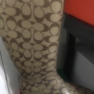 Signature tan and brown coach rain boots